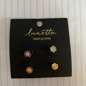 Two sets of sterling silver stud earrings